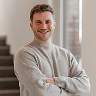 Een vriendelijke en glimlachende vertegenwoordiger van geoCapture